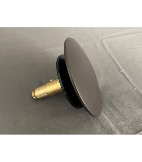 Replacement pop-up drain stopper for most freestanding tubs with integral overflows.