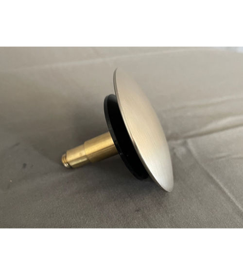 Replacement pop-up drain stopper for most freestanding tubs with integral overflows.